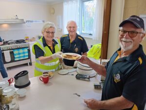 Lions serving food - Hallett Cove & Districts Lions Club